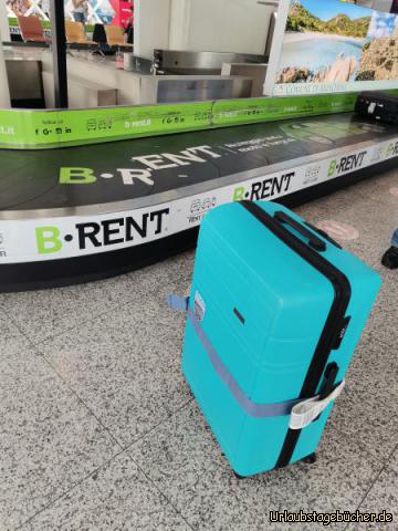 Koffer: Am Gepäckband Flughafen Olbia